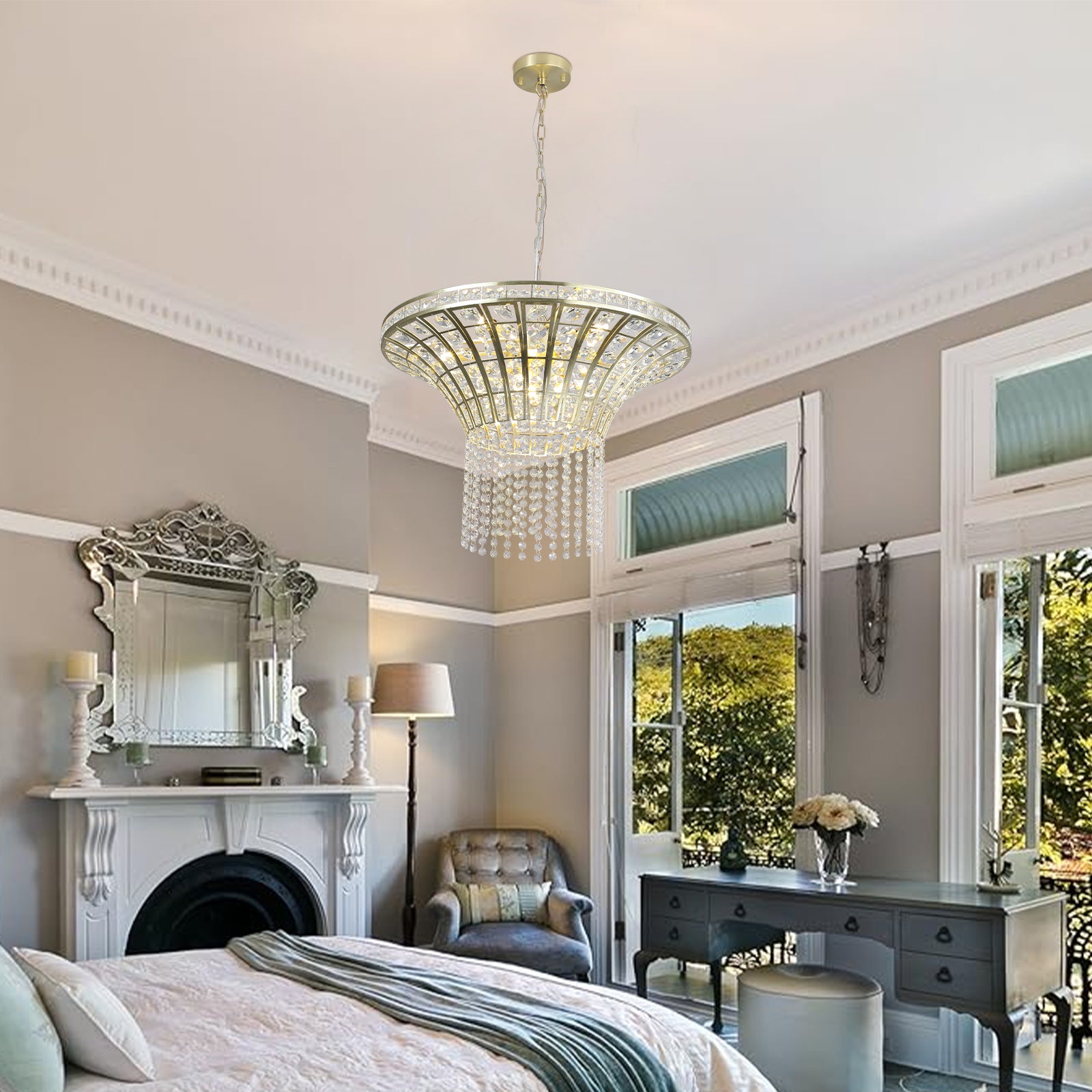 24" modern crystal round chandelier with gold finish hangs in a stylish bedroom, adding elegance above soft neutral decor.