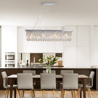 Elegant and Modern 8-Light Crystal Chandelier for Dining Room
Rectangular Raindrop Pendant Light Fixture with Contemporary Design
L39.4" x W9.8" x H8.7" (Bulb Not Included)